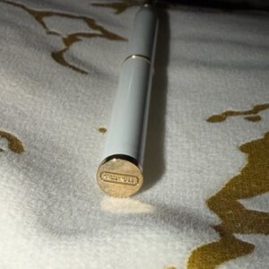 Coach Elegant White and Gold Pen
